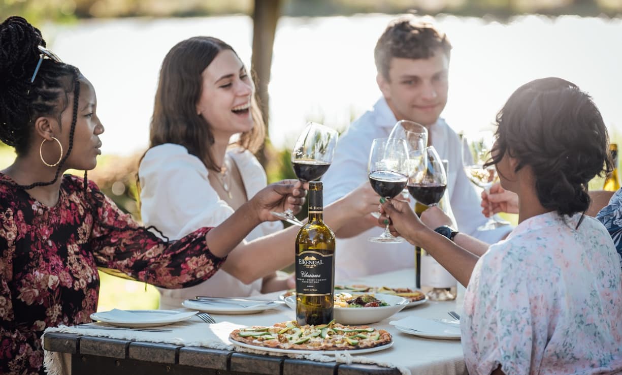 Guests raising a toast over lunch at Cucina di Giovanni